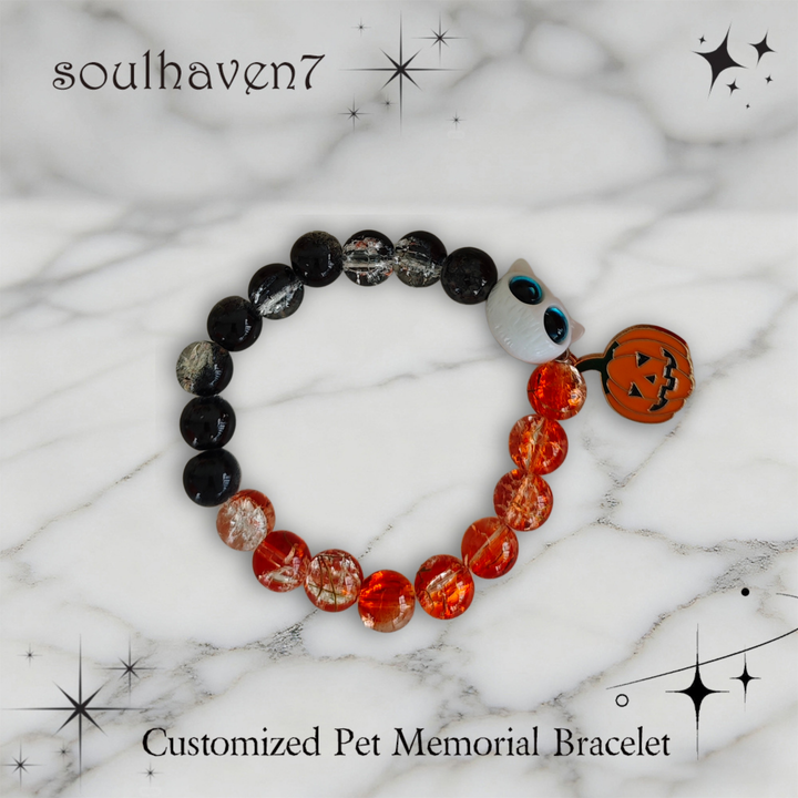 handmade Halloween pet loss bracelet with pumpkin charm