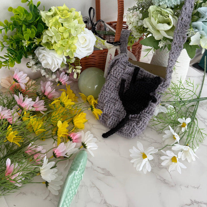 handmade crochet pet memorial bag with black cat design